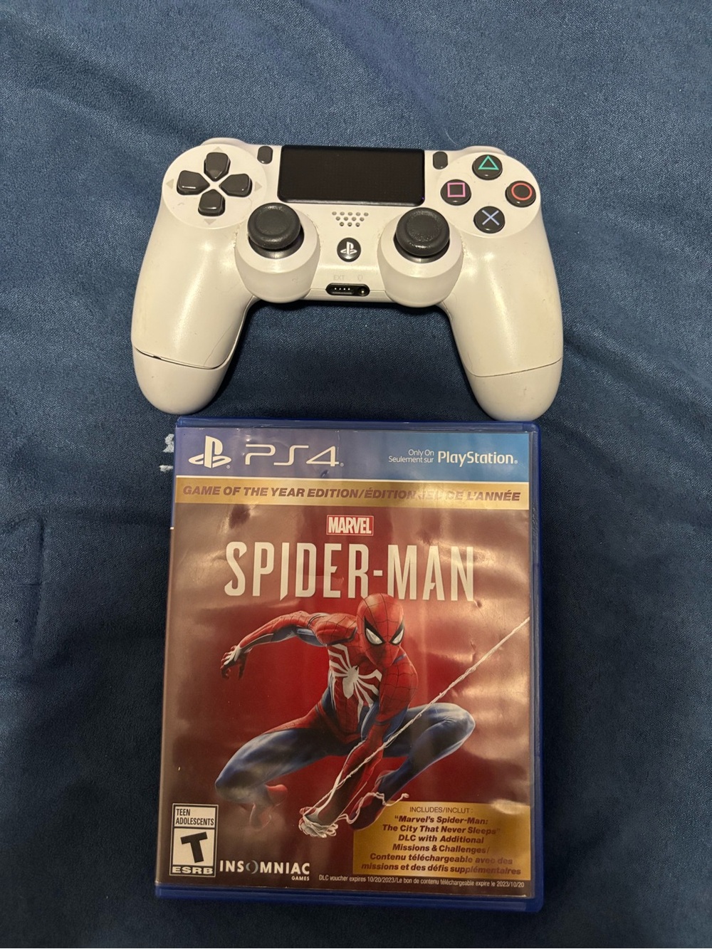 Sony White DualShock 4 Controller with Spider-Man PS4 Game